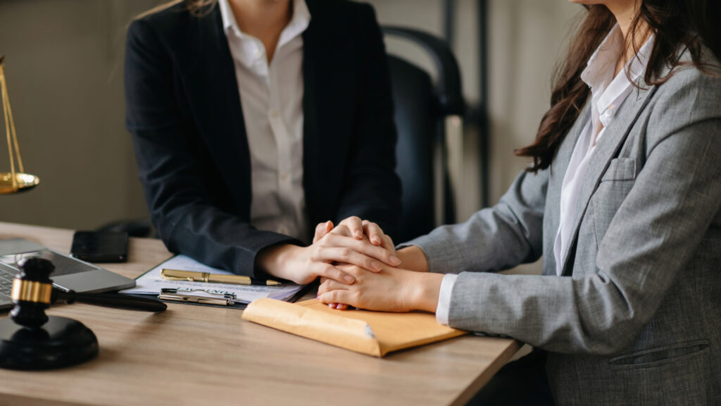 A client meets with an attorney for help with a small claims case in Florida. 